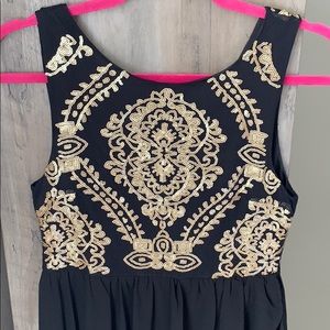 Black dress with gold sequins